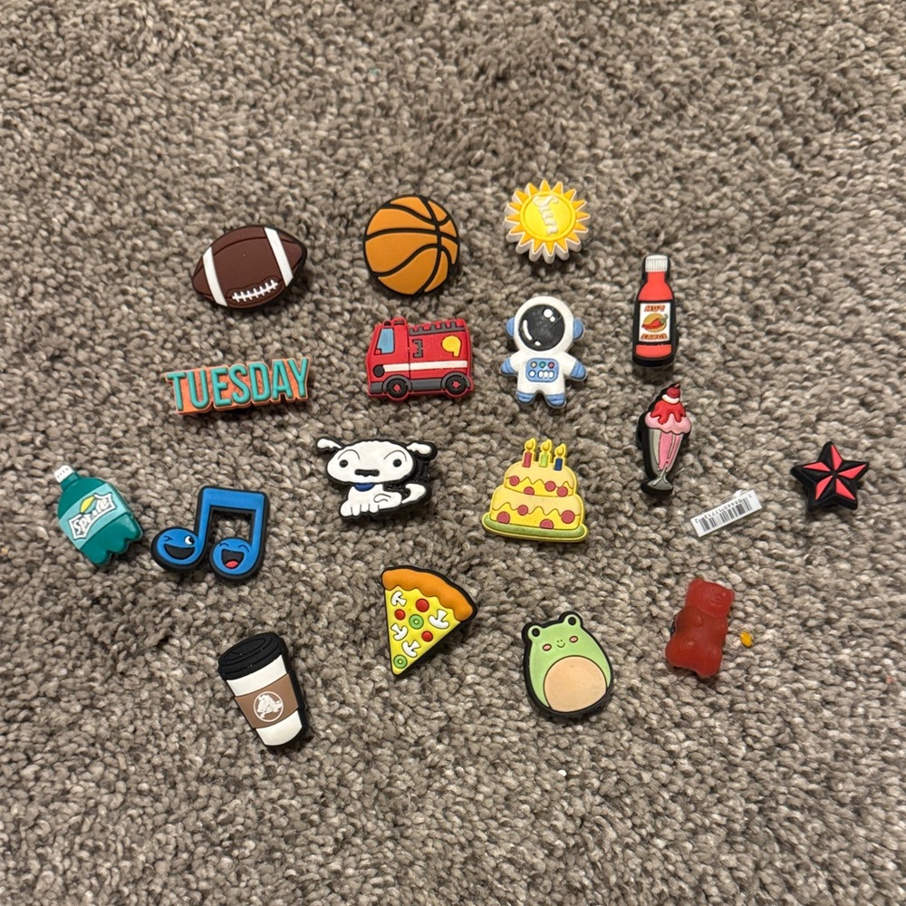 Assortment of shoe charms and croc tops